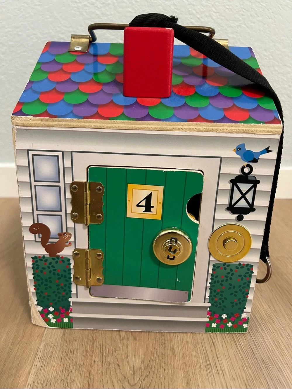 Melissa & DougTake-Along Wooden Doorbell Dollhouse -Doorbell Sounds, Keys-Toy